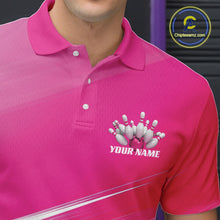 Load image into Gallery viewer, Close up left chest view of a pink bowling polo shirt featuring bowling ball and pins artwork blended into a geometric background.