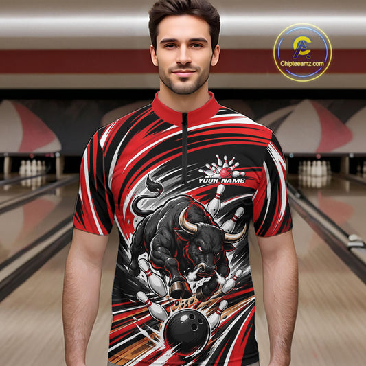 A man wearing a short-sleeve bowling quarter zip jersey with a red, black, and white graphic design featuring a bull and bowling pins. 