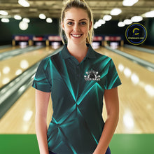Load image into Gallery viewer, Woman wearing a teal bowling shirt with a logo in a bowling alley