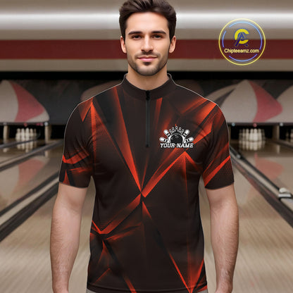 Man wearing a black and red bowling shirt with a personalized design in a bowling alley.