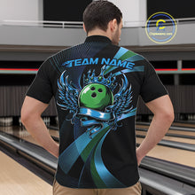 Load image into Gallery viewer, Person wearing a black bowling shirt with a green bowling ball design in a bowling alley.