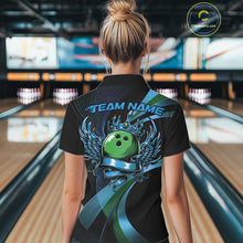 Load image into Gallery viewer, Person wearing a black bowling shirt with a green bowling ball design in a bowling alley.