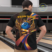 Load image into Gallery viewer, Person wearing a black bowling shirt with colorful design and 'TEAM NAME' text in a bowling alley.