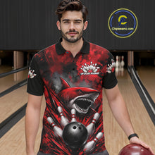 Load image into Gallery viewer, Man wearing a red and black graphic polo shirt with a shark design in a bowling alley.