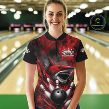 Load image into Gallery viewer, Woman wearing a red and black bowling shirt with a shark design in a bowling alley.