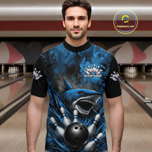Load image into Gallery viewer, Man wearing a blue and black bowling shirt with shark design in a bowling alley.