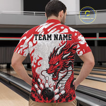 Load image into Gallery viewer, Person wearing a red and white bowling shirt with a dragon design and 'TEAM NAME' text, standing in a bowling alley.