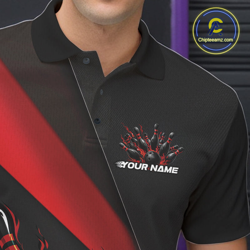 Close-up view of the left chest area of a black and red bowling polo shirt showing a flame bowling ball and pins design detail.