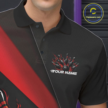 Close-up view of the left chest area of a black and red bowling polo shirt showing a flame bowling ball and pins design detail.