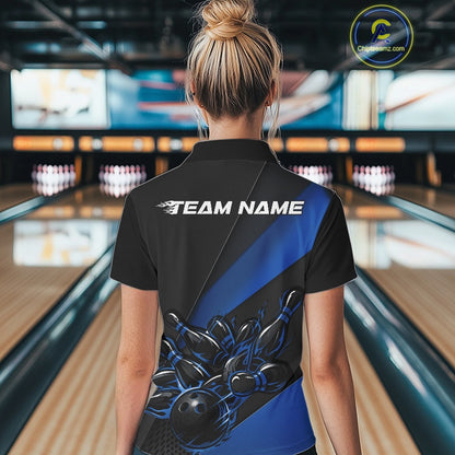 Female model back view in bowling lane wearing black and blue polo shirt showcasing flame bowling ball striking pins in vivid sports illustration.