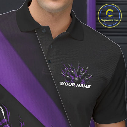 Close-up view of the left chest area of a black and purple bowling polo shirt showing a flame bowling ball and pins design detail.