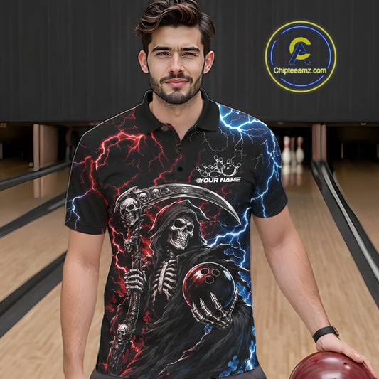 A man wearing a black short-sleeve polo shirt with a detailed graphic print of a grim reaper, lightning bolts, and a bowling ball, standing in a bowling alle