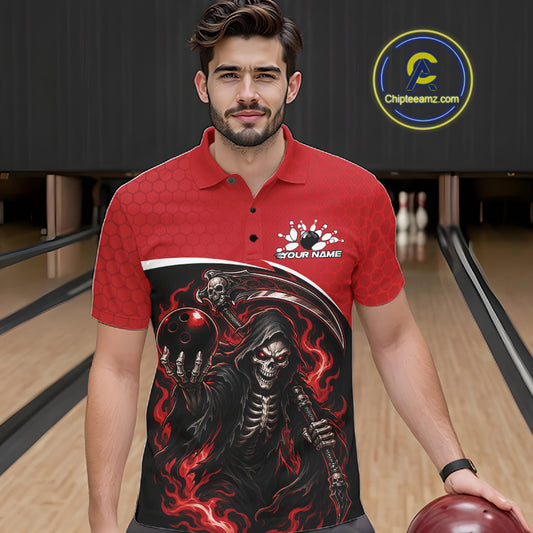 A man wearing a red short-sleeve polo shirt with a large black and red grim reaper graphic on the front, standing in a bowling alley and holding a bowling ball. 