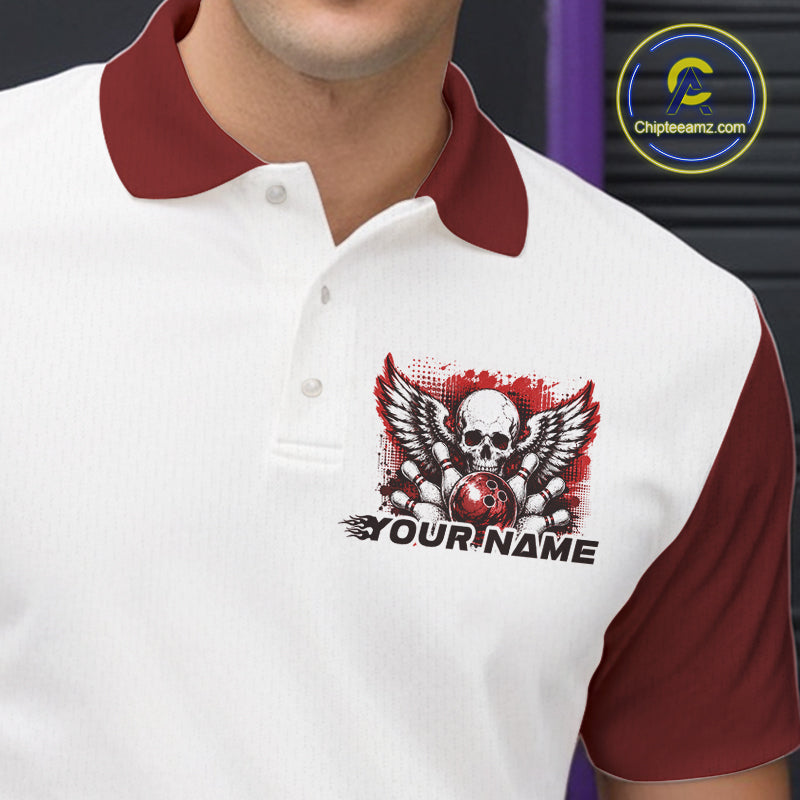 Close of a white mens bowling shirt with polo collar, red skull-themed bowling graphic with black wings, pins, bowling ball
