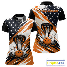 Load image into Gallery viewer, Front and back views of a black, white, and orange thin line american flag bowling women polo shirt with cobra artwork, bowling pins, an orange ball, and customizable name text.