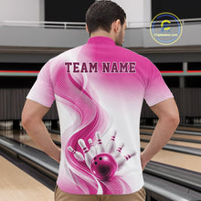 Load image into Gallery viewer, White and pink bowling quarter-zip worn by a male model, featuring elegant wave motifs and a glossy bowling strike illustration