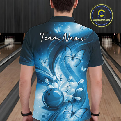 Back view of a blue bowling polo showcasing a bowling strike scene surrounded by butterfly details.