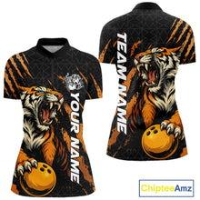 Load image into Gallery viewer, Front and back view of a black and yellow women's bowling quarter-zip shirt featuring a roaring tiger holding a yellow bowling ball with orange claw-stripe artwork and a geometric background pattern.