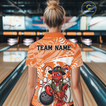 Load image into Gallery viewer, Back view of a female model in a bowling alley wearing an orange custom quarter-zip bowling shirt with a funny Cajun crawfish leaning on a bowling ball and a swamp-inspired texture background.