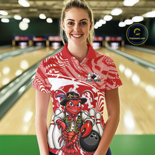Load image into Gallery viewer, Front view of a female model in a bowling alley wearing a red custom bowling polo shirt with a funny Cajun crawfish leaning on a bowling ball and a swamp inspired texture background.