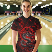 Load image into Gallery viewer, Front view of a happy female model in a bowling alley wearing a red custom quarter-zip bowling shirt featuring an ancient dragon, flames, and a moon-inspired bowling ball design.