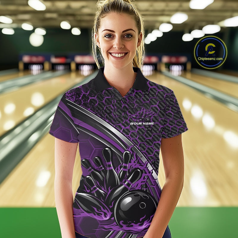 Female model in a bowling alley wearing a black and purple polo shirt with honeycomb accents and a dynamic flame bowling action illustration.