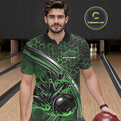 Male model in a bowling lane wearing a black and green polo shirt, featuring a honeycomb pattern with a flaming bowling ball striking pins.