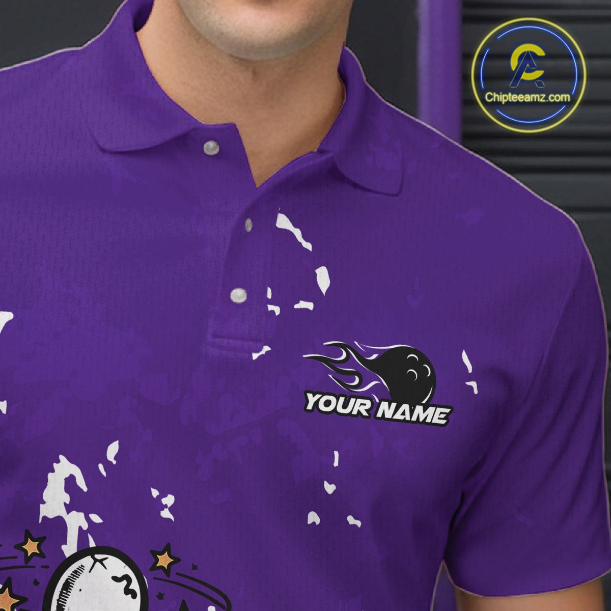Close-up view of left chest area of a purple and white polo shirt, showing small detailed drunk bowling pin graphic with beer bottle and bowling ball.