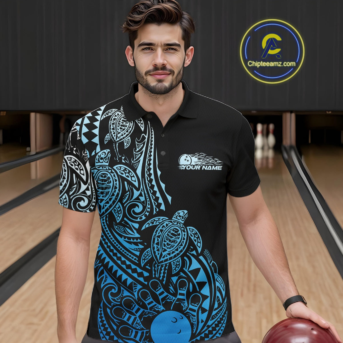 Male model wearing a black and blue bowling polo shirt at the lane with Polynesian-style bowling graphics.