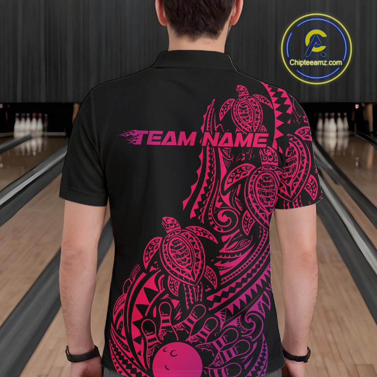 Back view of a male model in a black, pink, and purple bowling polo shirt showcasing turtle-themed bowling artwork and tribal swirls.