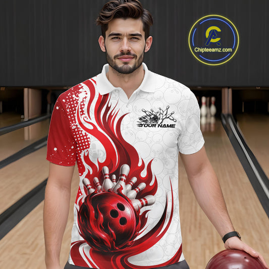 A man wearing a custom bowling polo shirt with a red and white flame-and-bowling-ball graphic, standing in a bowling alley.