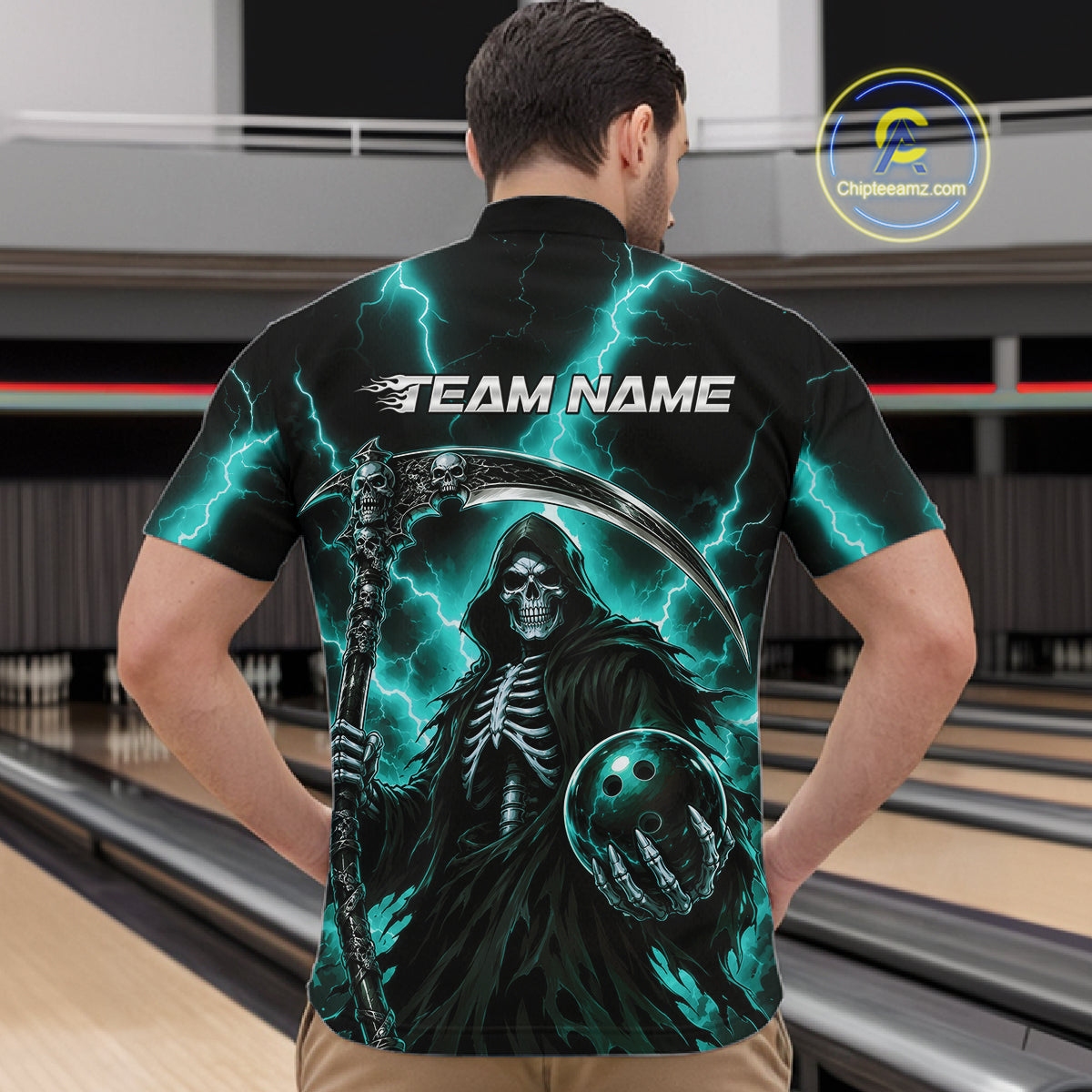 A man viewed from behind wearing a black short-sleeve bowling shirt with a large grim reaper graphic, teal lightning effects, and the text 'TEAM NAME' across the upper back. Bowling lanes are visible in the background, and a circular 'Chuteamz.