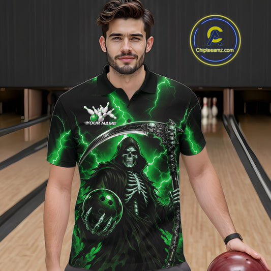 A man wearing a black short-sleeve polo shirt with a green and black grim reaper graphic, standing in a bowling alley. The shirt features a skeleton holding a bowling ball with green lightning effects.