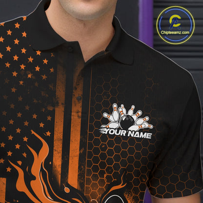 Close-up of a black and orange bowling polo shirt left chest showcasing patriotic flames and bowling strike graphics.