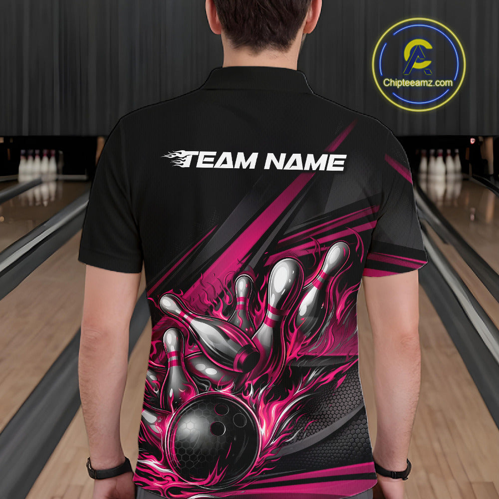 Male model at a bowling lane, back view of black polo shirt showcasing hot pink flame bowling ball and pins with abstract stripe artwork