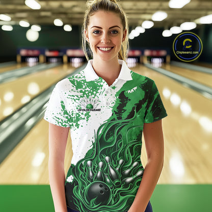 In bowling lane front view female model wearing bowling polo shirt, black green and white color scheme, flame bowling ball and pins artwork, dynamic sports environment