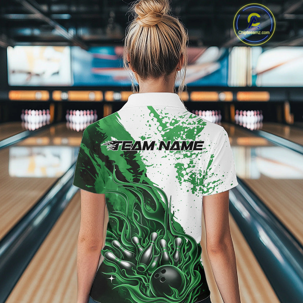 Bowling lane back view female model wearing bowling polo shirt, flame bowling ball and pins artwork, black green and white palette, athletic promotional sports scene