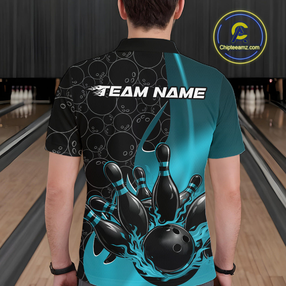 Back view of a male model in a bowling lane wearing a black and blue polo shirt featuring flaming black bowling ball striking pins with bold sports styling.
