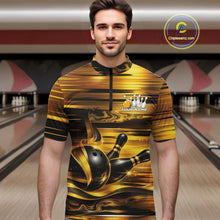 Load image into Gallery viewer, Front view of a male model inside a bowling center wearing a bowling quarter-zip shirt with glossy gold and black bowling ball and pins graphics.