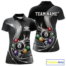 Load image into Gallery viewer, Front and back mockup of a womens black and silver billiard polo featuring metallic ribbons, dark honeycomb graphics, and a flaming 8-ball with pool balls