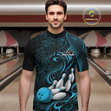 Load image into Gallery viewer, Male model wearing a black and blue bowling quarter-zip shirt in a bowling alley featuring a tribal flame bowling ball and pins graphic