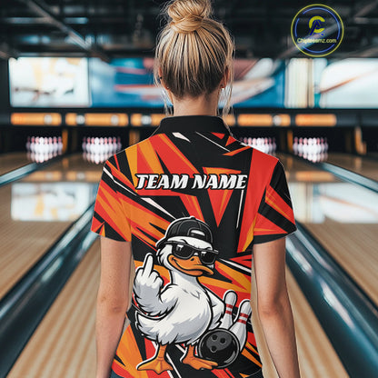 Back view of a black and orange womens bowling quarter-zip displaying duck graphics with bowling-inspired details.
