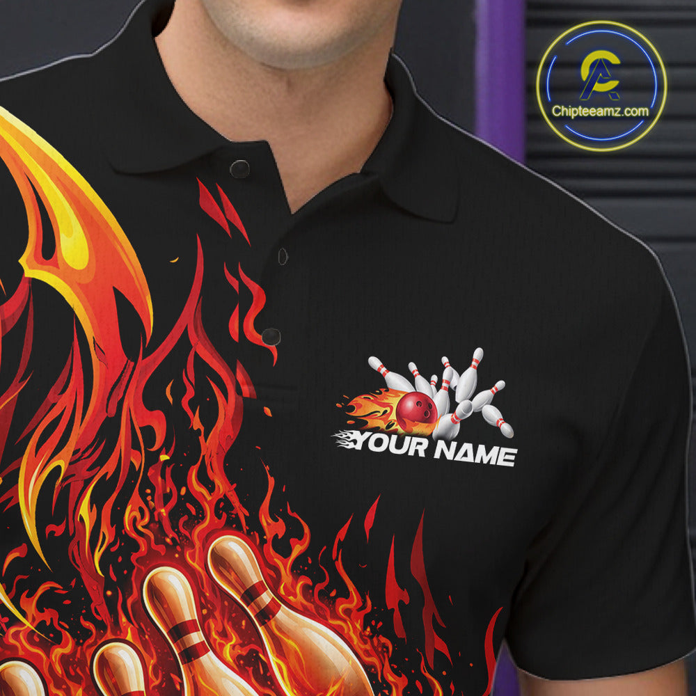 Close-up left chest detail of a black and red bowling polo with flaming bowling strike illustration.