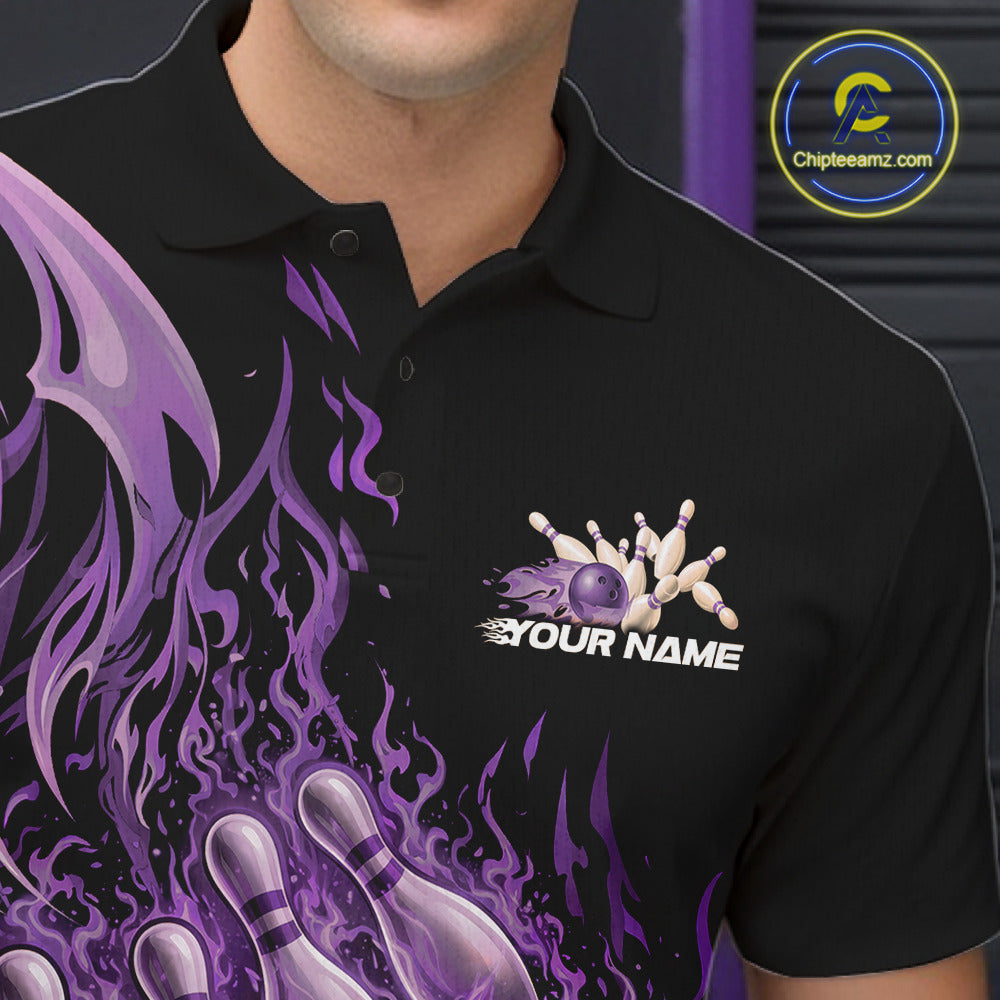 Close-up of the left chest area on a black and purple bowling polo featuring a flaming bowling ball and pin illustration.