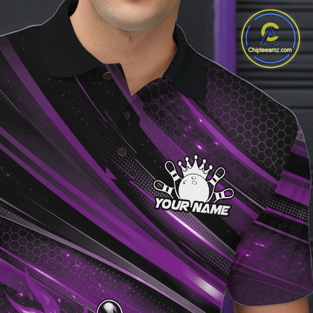Close-up left chest view of a black and purple bowling polo shirt featuring a fiery bowling ball hitting the pins with abstract stripes.