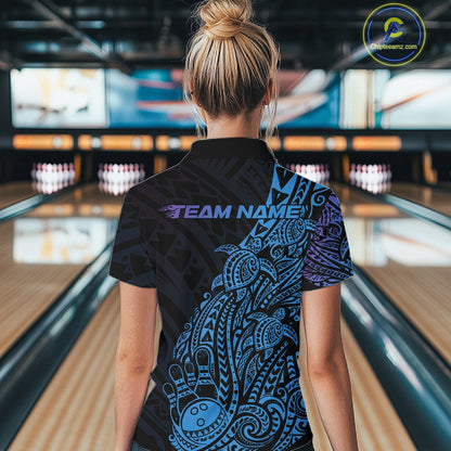 Back view of a female model in a black, blue, and purple bowling quarter-zip shirt showcasing turtle-themed tribal bowling artwork.