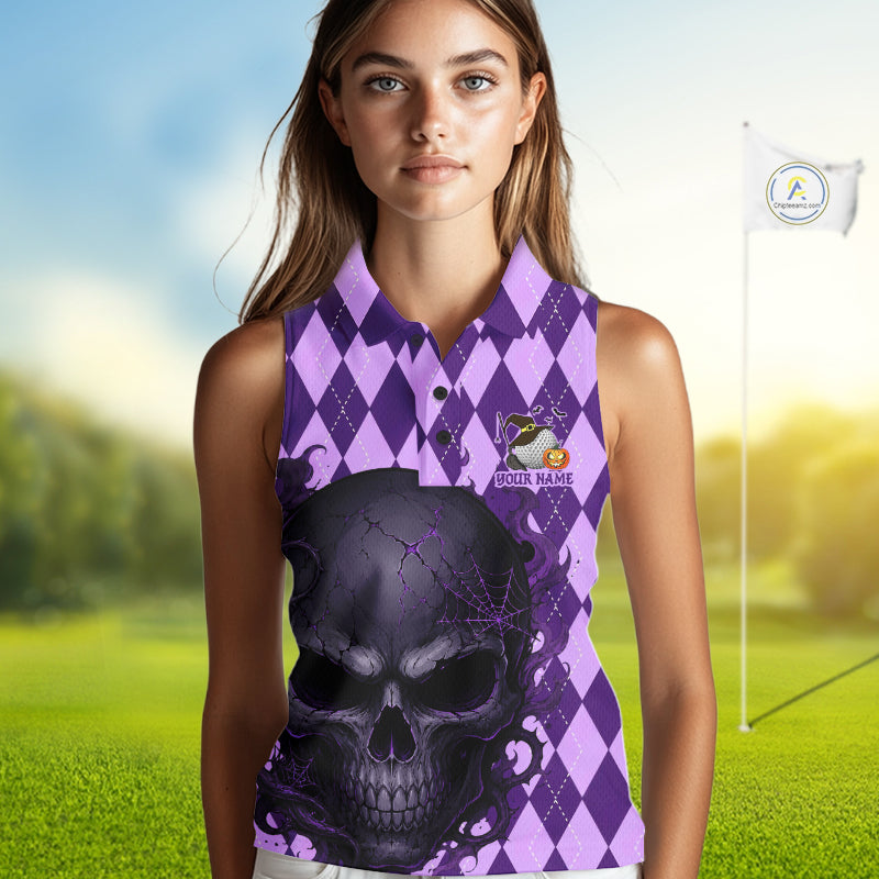 A sleeveless women's polo shirt with a purple and lavender argyle pattern and a large black skull graphic on the front, modeled on a woman standing on a blurred golf course background.
