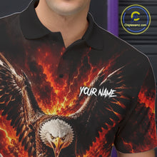 Load image into Gallery viewer, Black polo shirt with fiery eagle design and 'Your Name' text, brand logo visible.