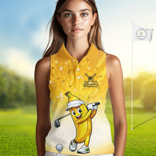 Load image into Gallery viewer, Person wearing a yellow sleeveless golf shirt with a cartoon banana character on a golf course.