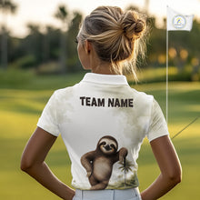 Load image into Gallery viewer, Person wearing a white polo shirt with a sloth graphic and 'TEAM NAME' text on a golf course.